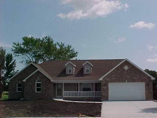 186 Chicago Road Paw Paw, IL 61353 - Photo 1 of 1 a view of house with an outdoor space