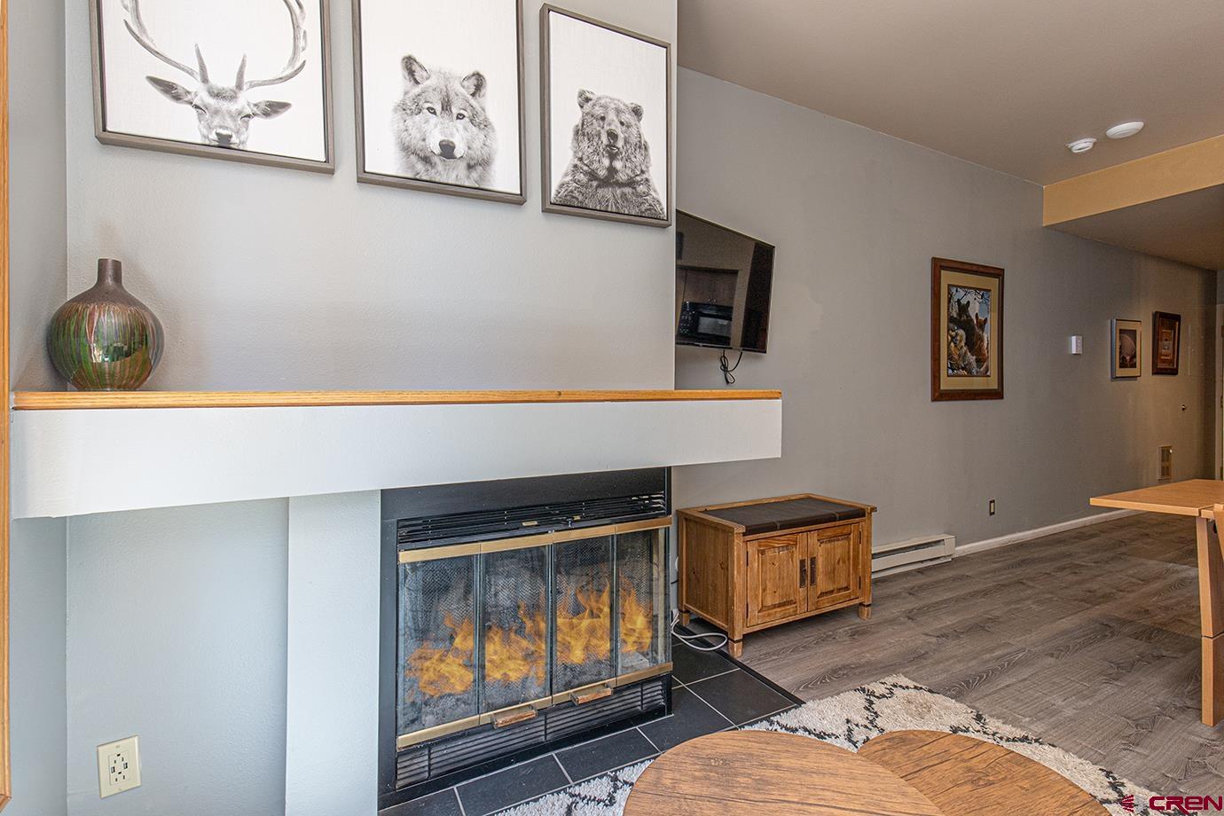 71 Needles Way, Unit 343 Durango, CO 81301 - Photo 8 of 18 a room with furniture and painting on the wall