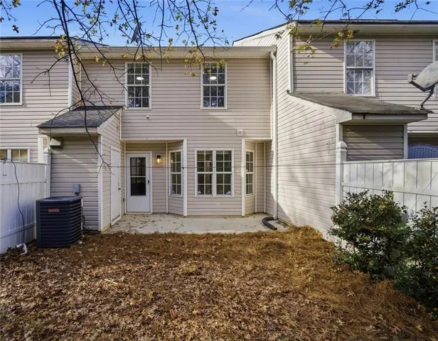 a view of a house with a garden