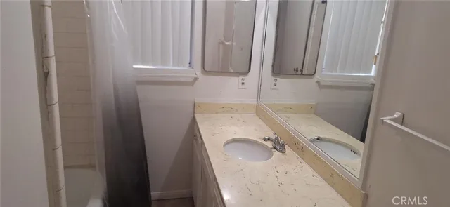 a bathroom with a sink and a washing machine