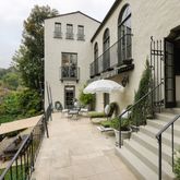 a view of patio with furniture