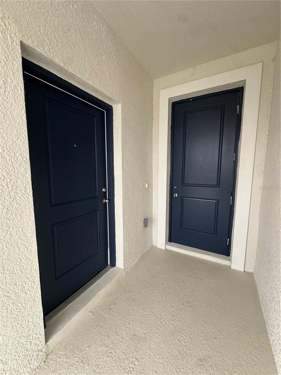 1623 Marksman Road Eagle Lake, FL 33839 - Photo 6 of 24 an empty room with closet and mirror