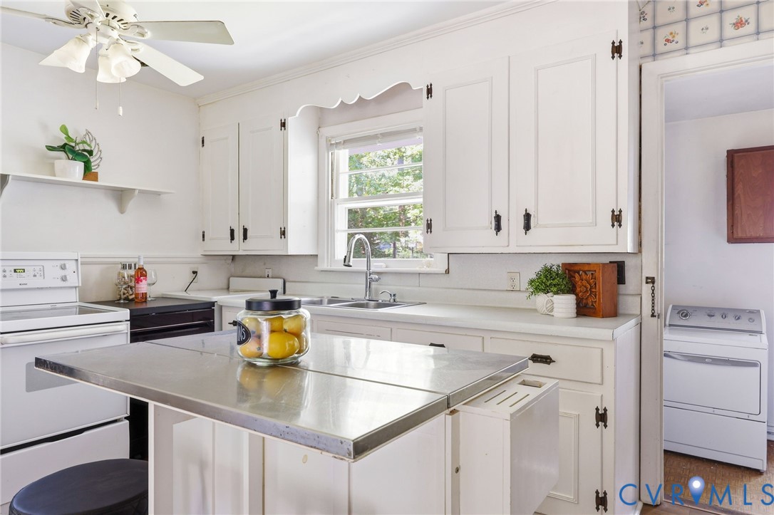 3400 Warner Road Richmond, VA 23225 - Photo 12 of 33 White cabinetry, mobile island, new DW, new faucet