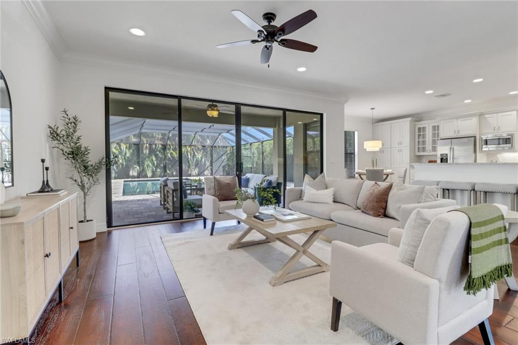 13577 Mandarin Circle Naples, FL 34109 - Photo 2 of 46