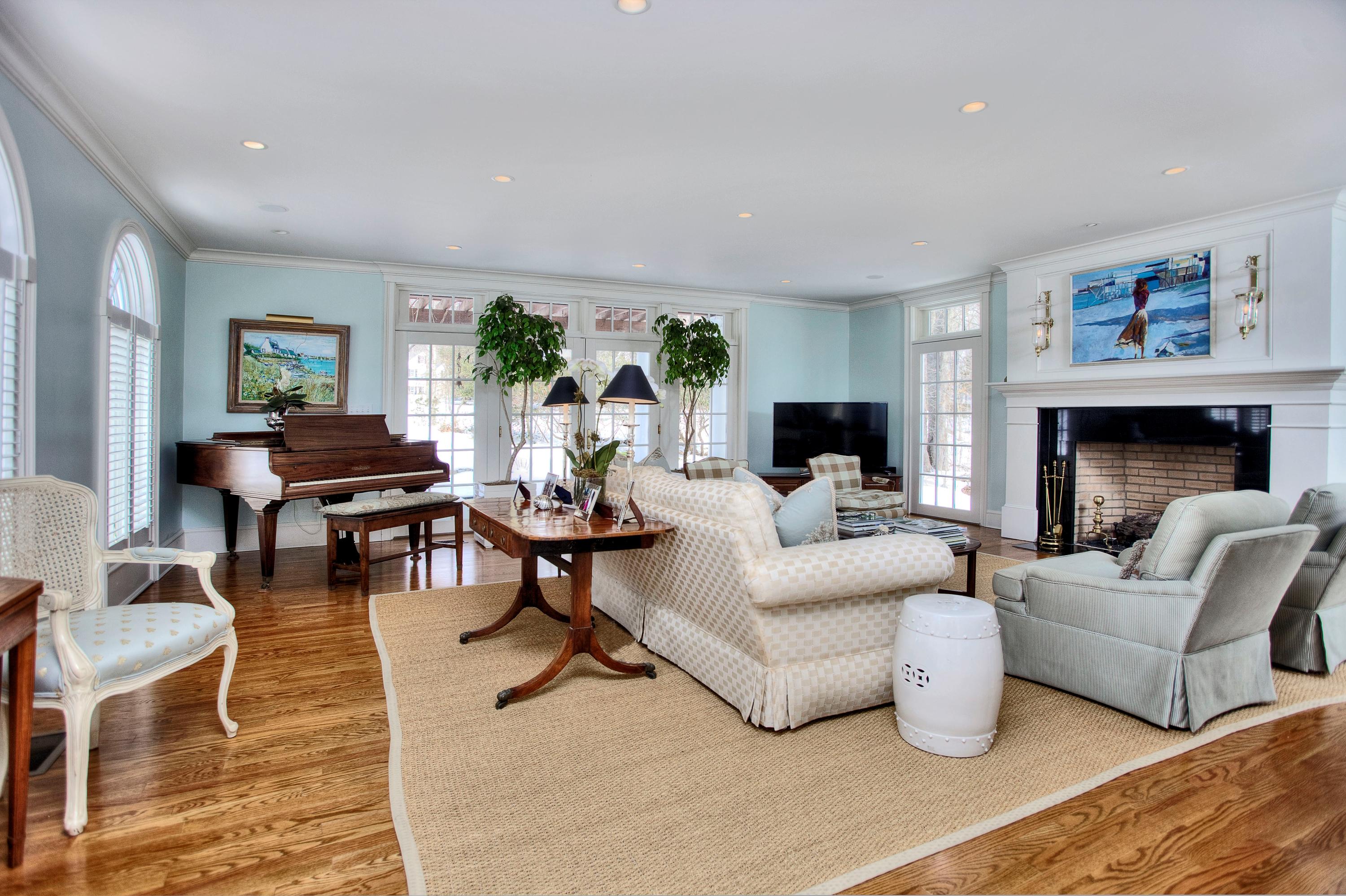95 Pembroke Road Darien, CT 06820 - Photo 3 of 24 a living room with furniture fireplace and a large window