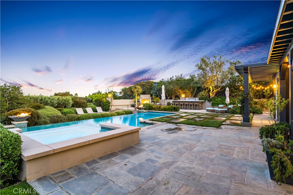 28850 Hampton Place Malibu, CA 90265 - Photo 48 of 53 a view of swimming pool with outdoor seating and yard