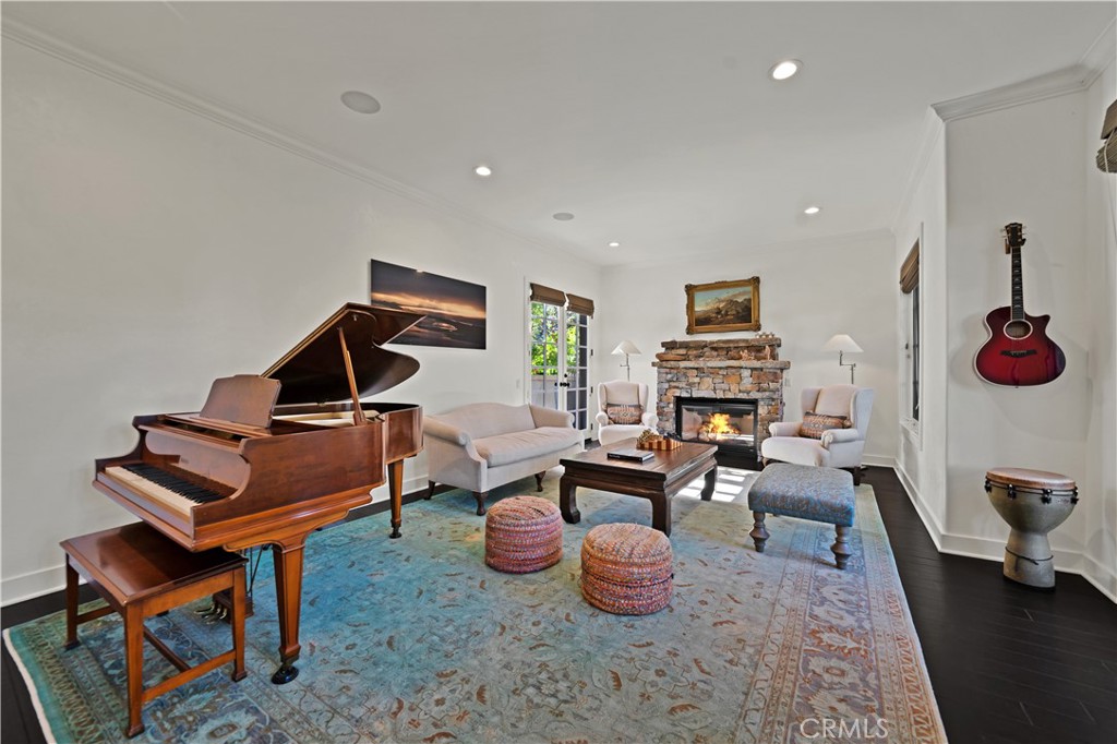 28850 Hampton Place Malibu, CA 90265 - Photo 9 of 53 a living room with furniture and a fireplace