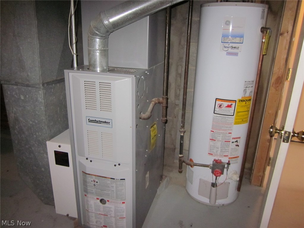 13587 Whitney Road Strongsville, OH 44136 - Photo 14 of 21 One of the furnaces and Hot Water Tanks. Each unit has separate