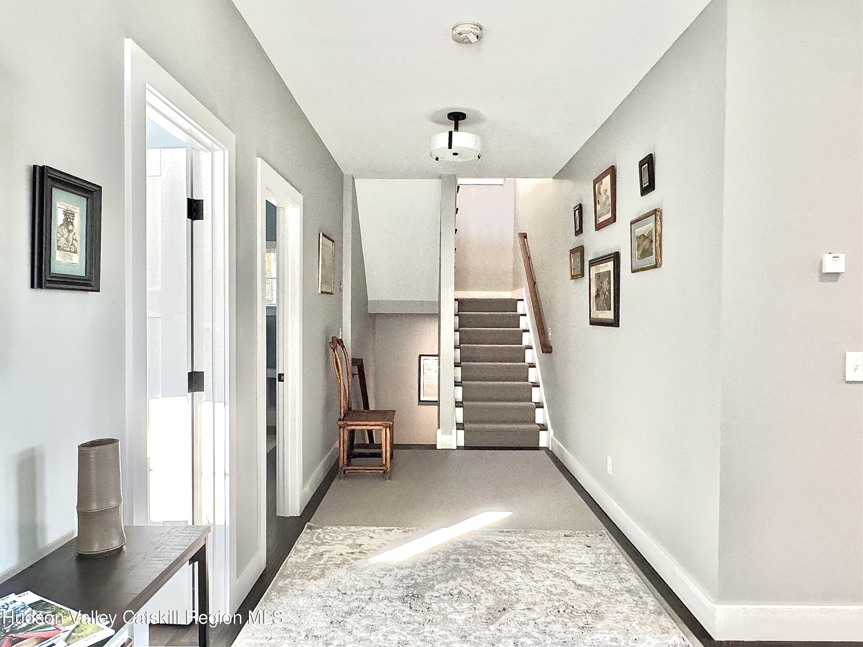 720 Sunny Hill Road Greenville, NY 12083 - Photo 17 of 44 a view of entryway with furniture and wooden floor
