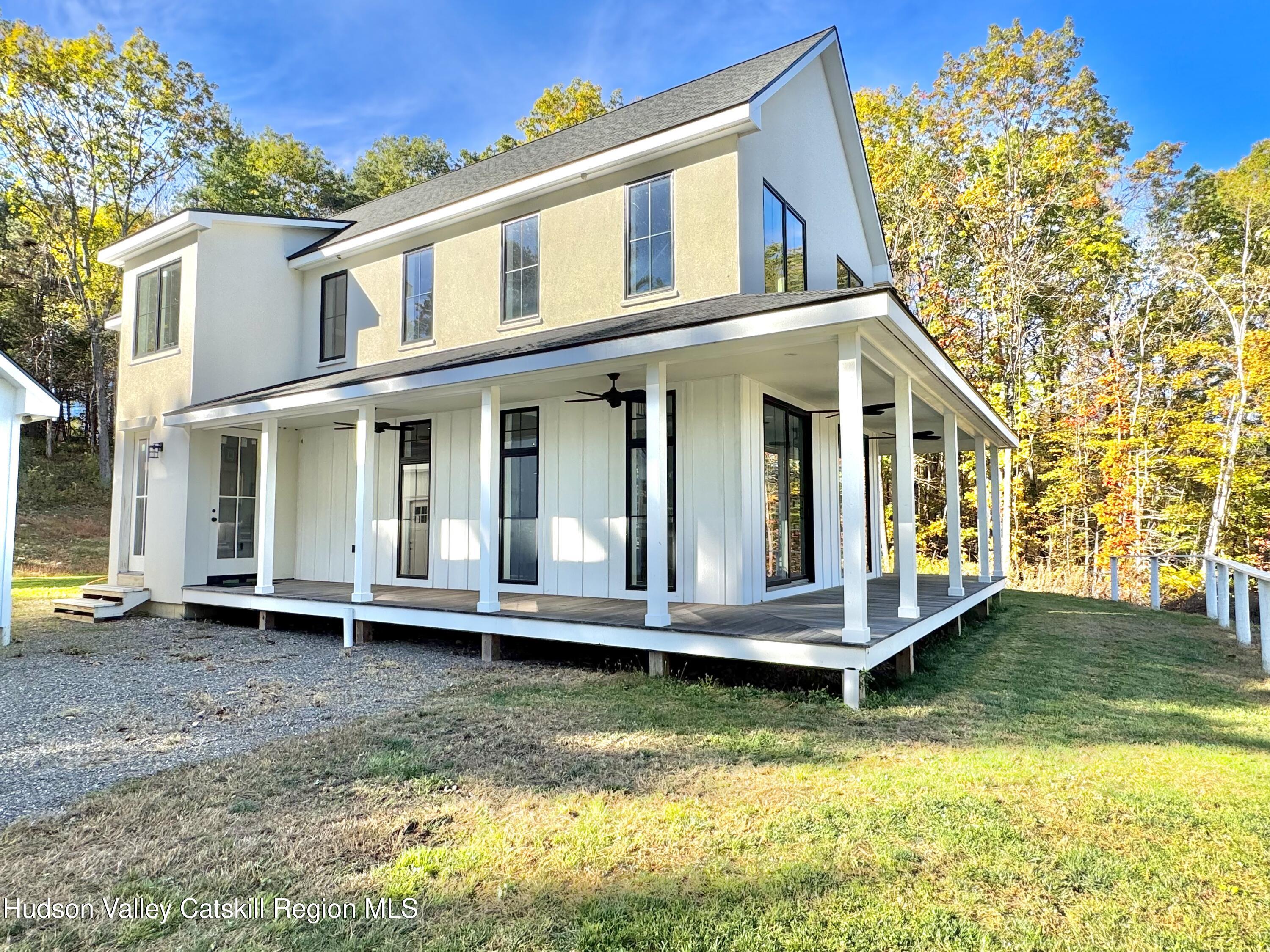 720 Sunny Hill Road Greenville, NY 12083 - Photo 3 of 42 a view of an house with backyard space and swimming pool