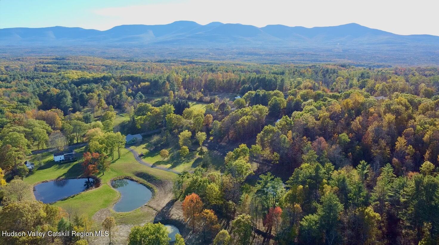 720 Sunny Hill Road Greenville, NY 12083 - Photo 39 of 44 a view of a house with a mountain