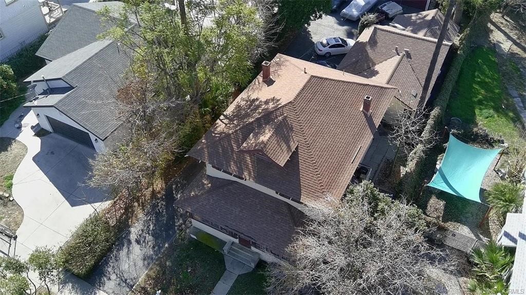 2726 5th Street, Unit 2 Riverside, CA 92507 - Photo 3 of 12 an aerial view of a house with a yard and outdoor seating