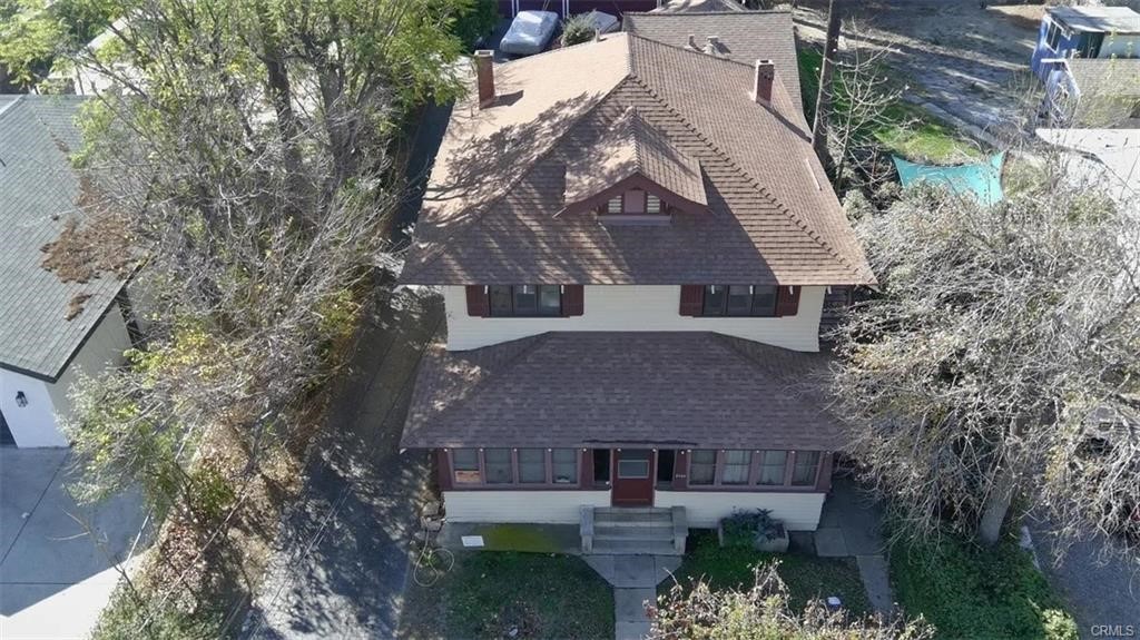 2726 5th Street, Unit 2 Riverside, CA 92507 - Photo 4 of 12 an aerial view of a house with garden space and a building