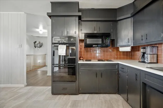 a bedroom with furniture and a bed