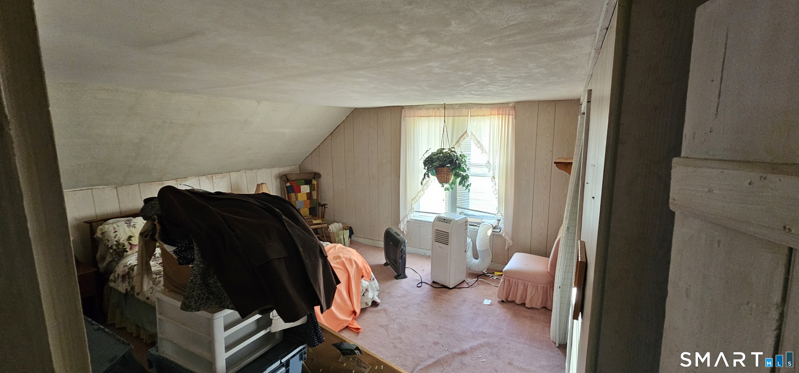 933 Hampton Road Pomfret, CT 06259 - Photo 15 of 16 a view of walk in closet with clothes and shoes
