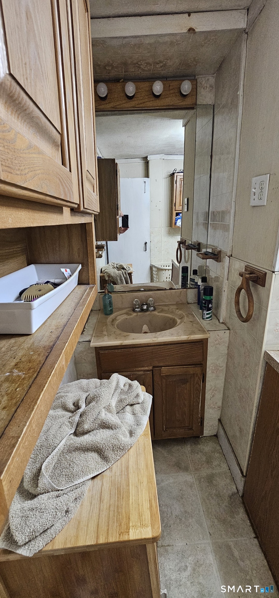933 Hampton Road Pomfret, CT 06259 - Photo 10 of 16 a bathroom with a sink and a mirror