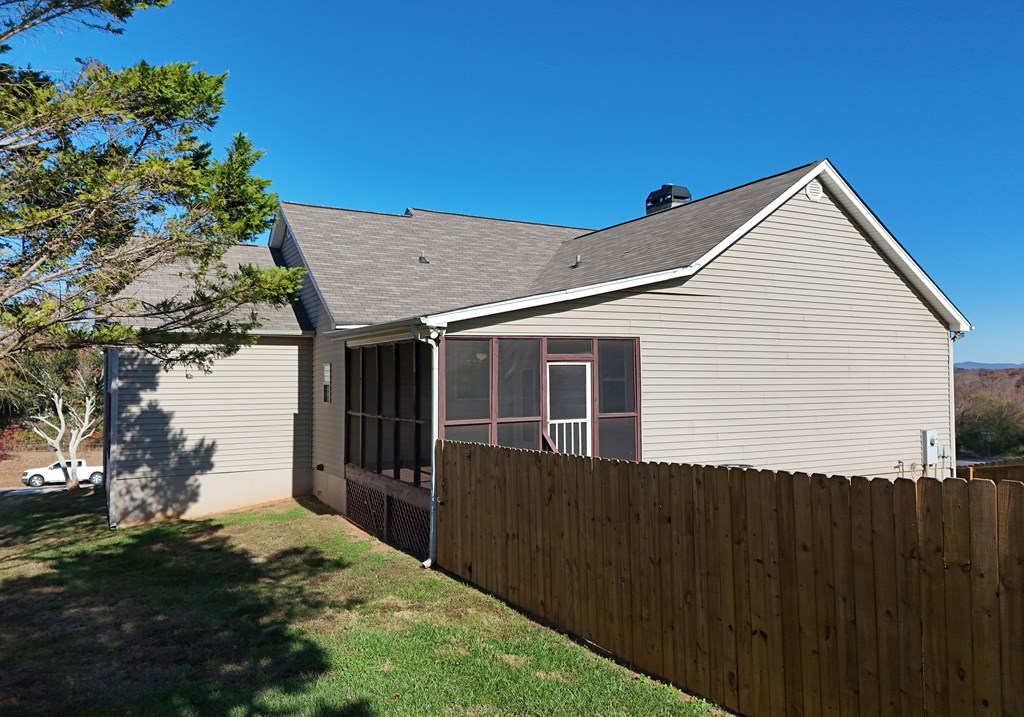 328 Asa Dorsey Road Cleveland, GA 30528 - Photo 28 of 35 a backyard of a house with wooden fence