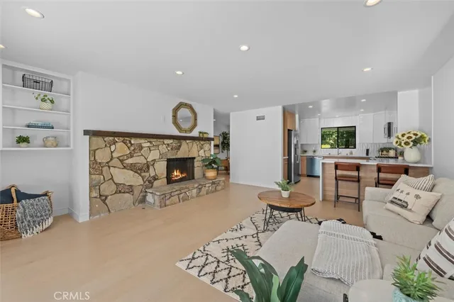 a kitchen with a sink cabinets and window