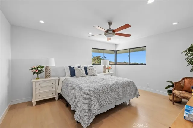 a bed room with furniture and a window