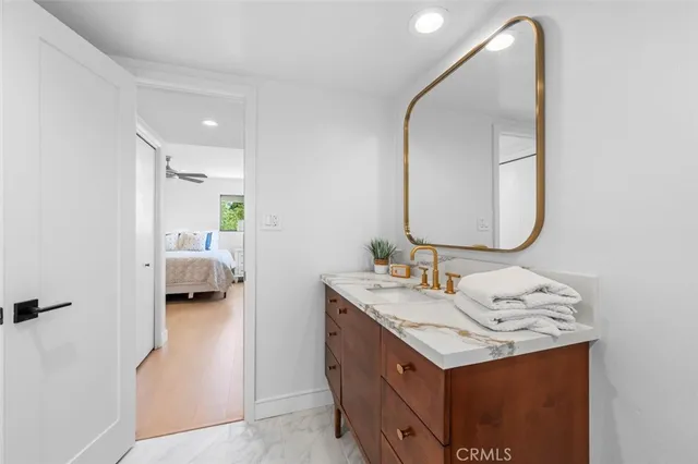 an aerial view of residential houses with outdoor space and street view