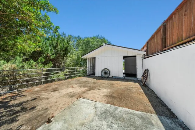 a view of a room with wooden walls