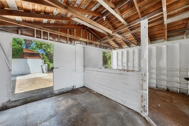 a view of a backyard with plants