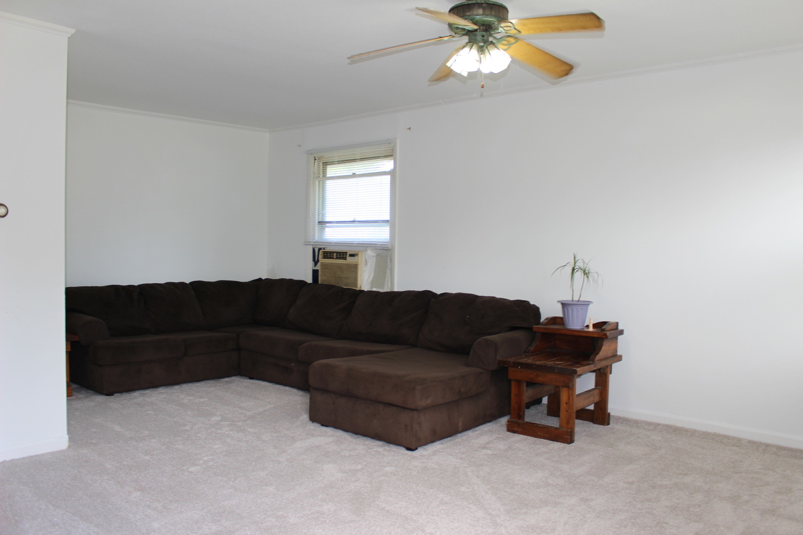 1914 Inner Cir Drive Crest Hill, IL 60403 - Photo 11 of 26 a living room with furniture and a window