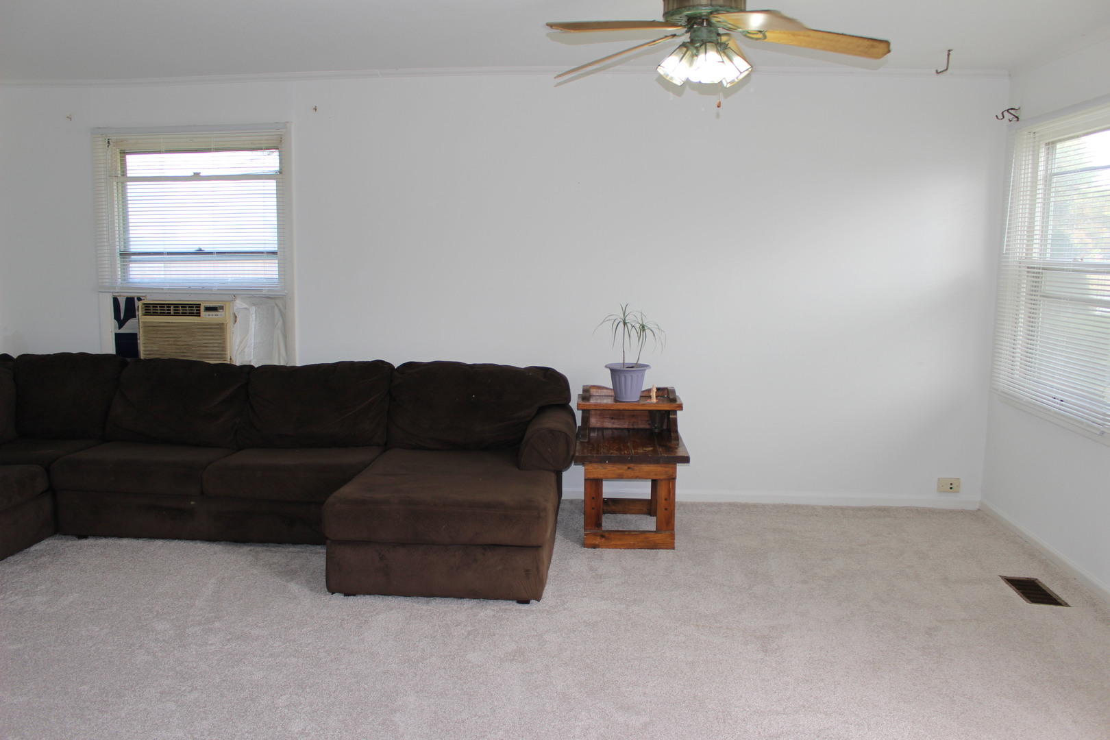 1914 Inner Cir Drive Crest Hill, IL 60403 - Photo 12 of 26 a living room with furniture and a chandelier