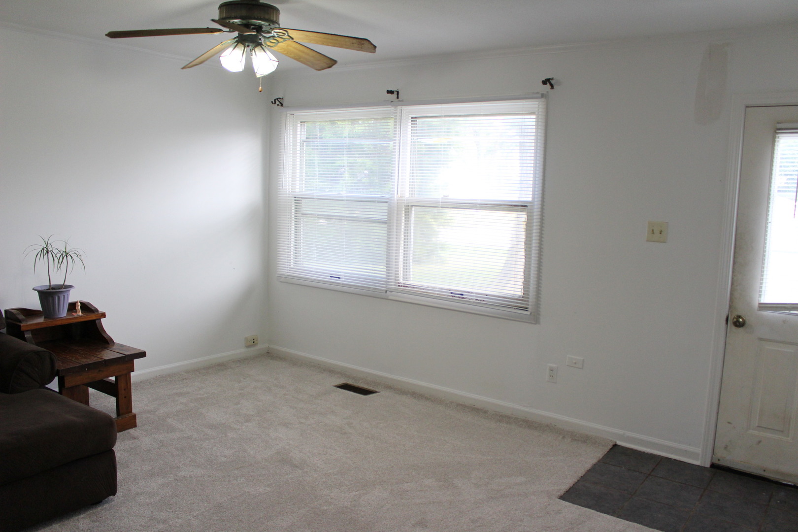 1914 Inner Cir Drive Crest Hill, IL 60403 - Photo 13 of 26 a room with a window and a fan