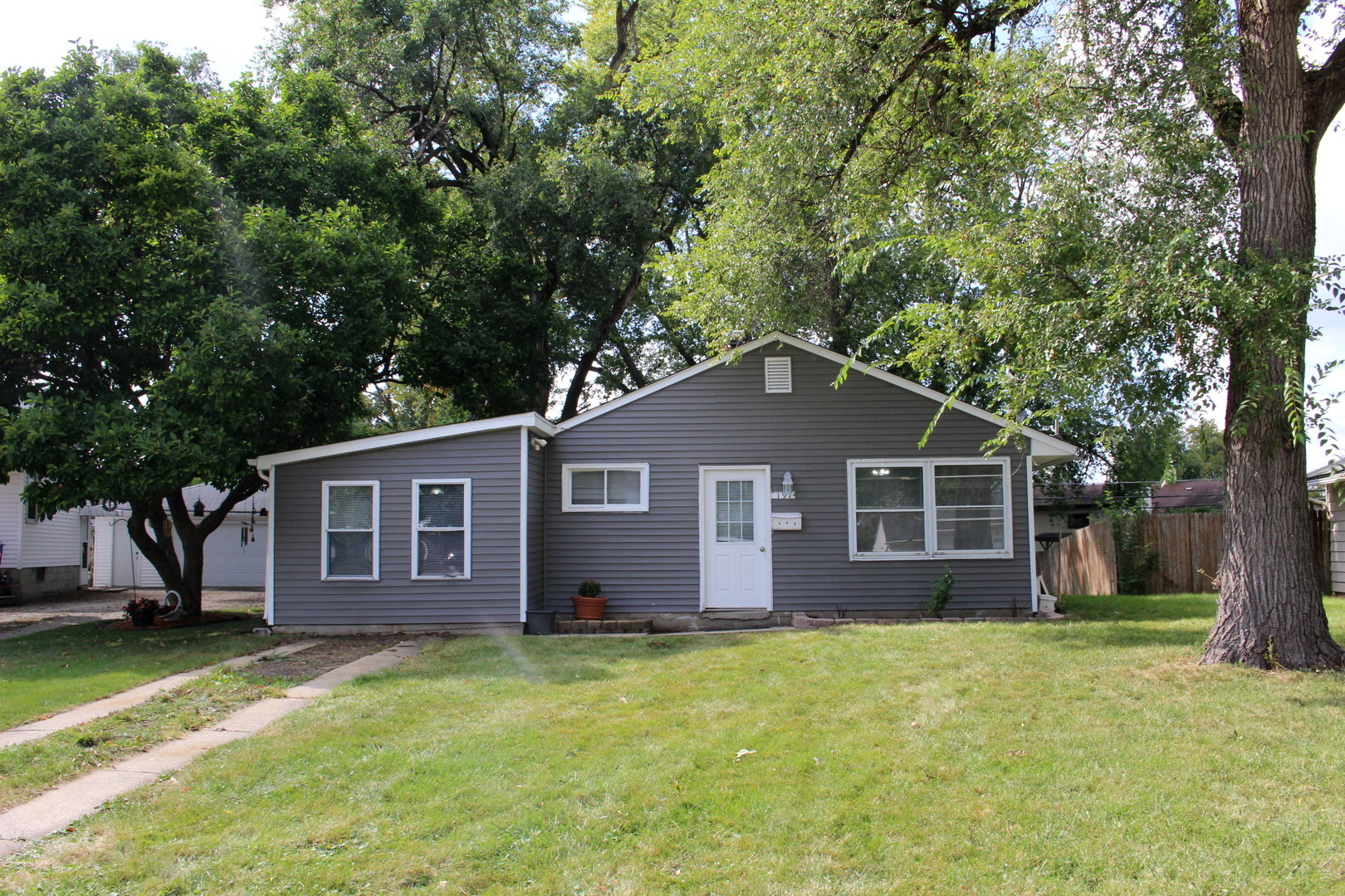 1914 Inner Cir Drive Crest Hill, IL 60403 - Photo 2 of 26 a view of a house with a yard