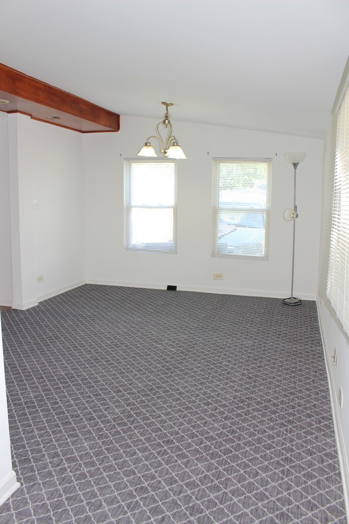 1914 Inner Cir Drive Crest Hill, IL 60403 - Photo 22 of 26 an empty room with windows
