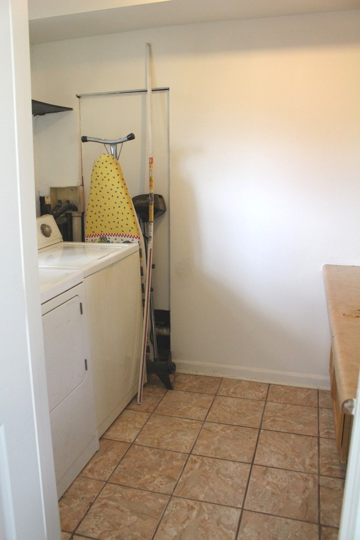 1914 Inner Cir Drive Crest Hill, IL 60403 - Photo 24 of 26 a view of a storage & utility room with washer and dryer