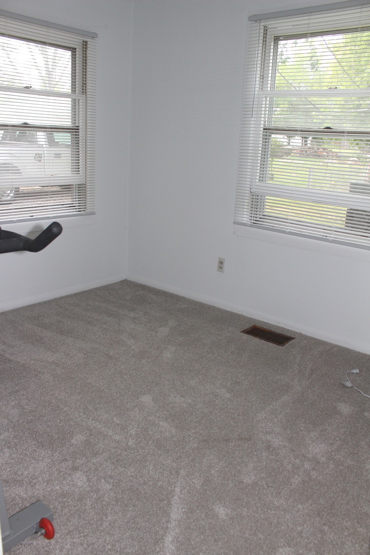 1914 Inner Cir Drive Crest Hill, IL 60403 - Photo 5 of 26 an empty room with a window