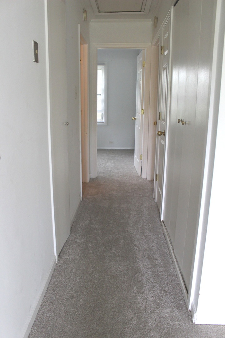 1914 Inner Cir Drive Crest Hill, IL 60403 - Photo 9 of 26 a view of hallway with a mirror
