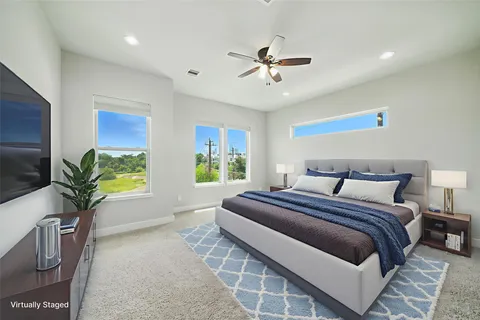 a view of a balcony with wooden floor and fence