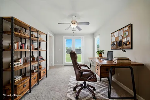 a workspace with a bookshelf