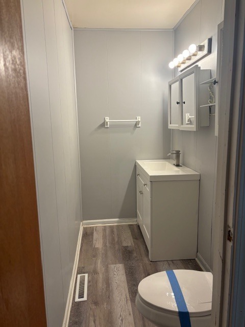 1316 Monroe Street Lake In The Hills, IL 60156 - Photo 18 of 20 a bathroom with toilet sink and mirror