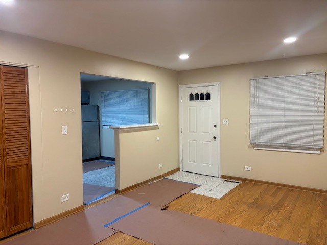 1316 Monroe Street Lake In The Hills, IL 60156 - Photo 7 of 20 an empty room with closet and mirror