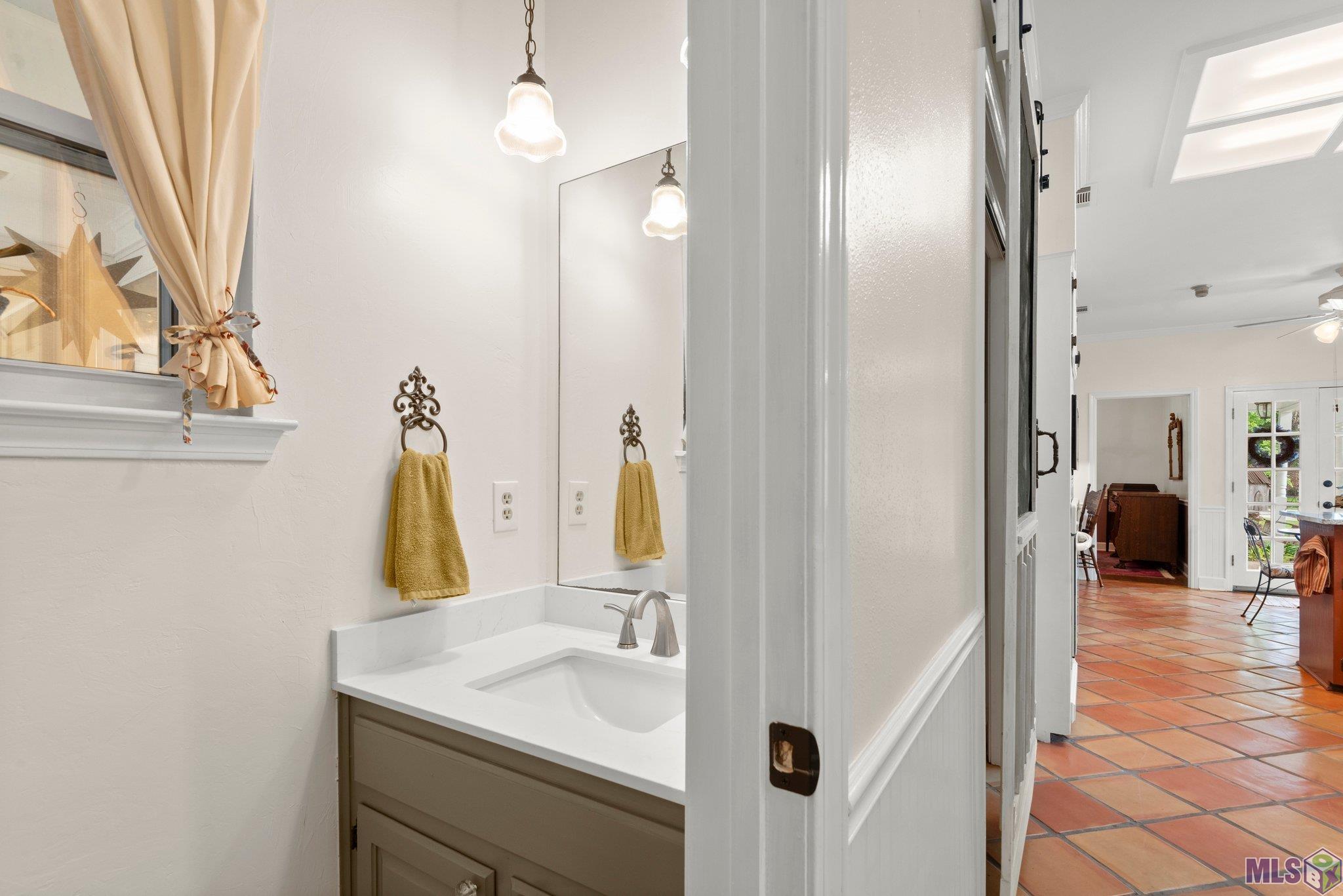 2829 Rene Beauregard Avenue Baton Rouge, LA 70820 - Photo 12 of 37 Powder Room off Kitchen