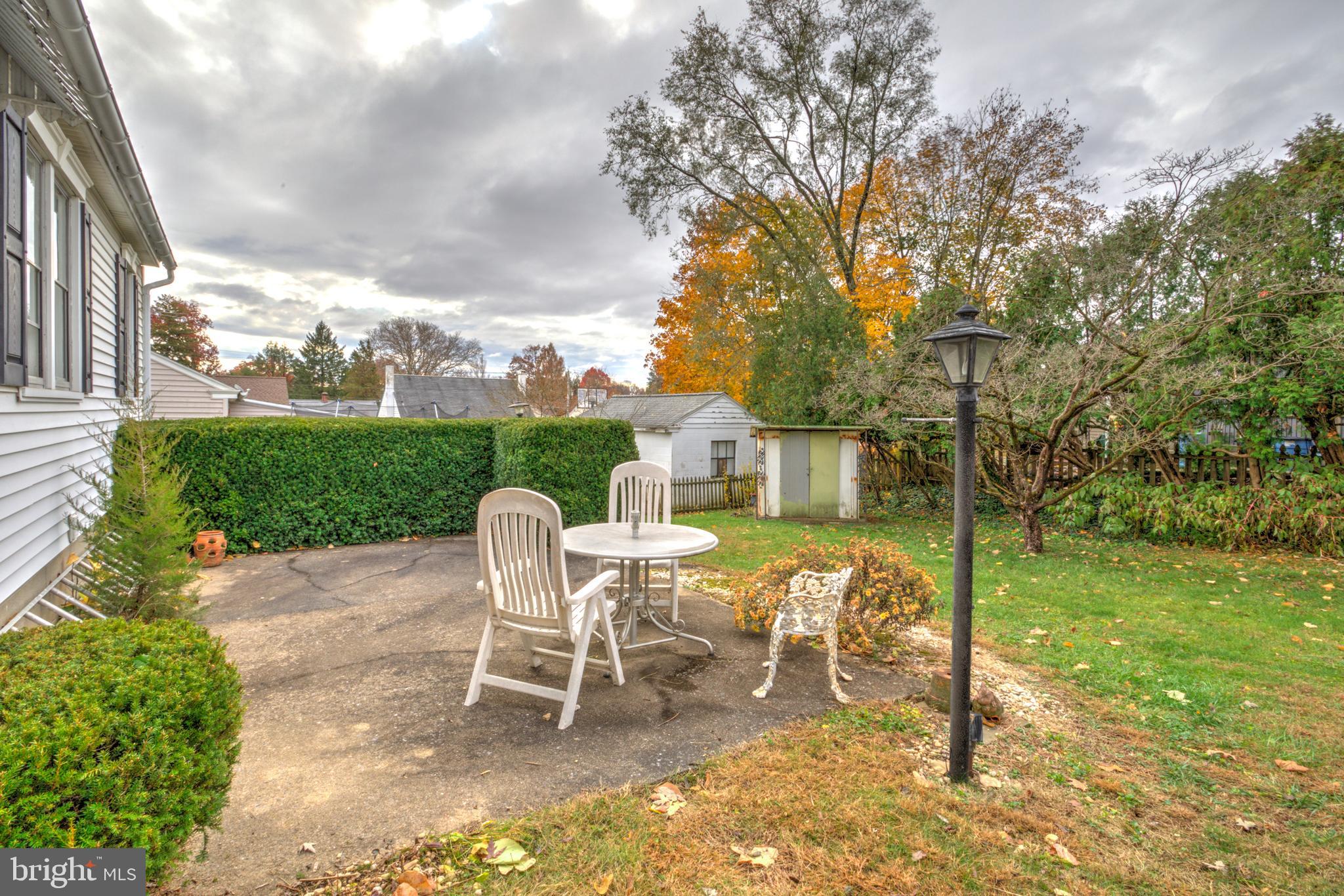 216 North Pitt Street Manheim, PA 17545 - Photo 26 of 30 a view of a house with a yard patio and furniture