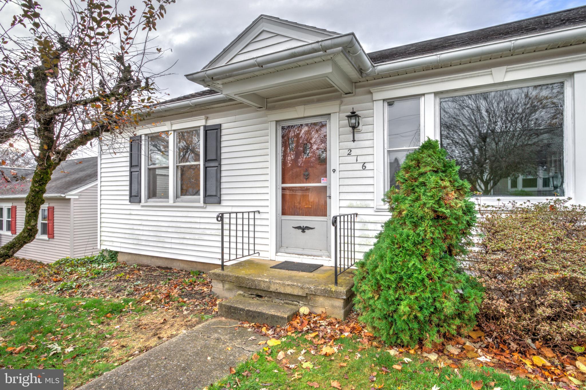216 North Pitt Street Manheim, PA 17545 - Photo 4 of 30 a front view of a house with garden
