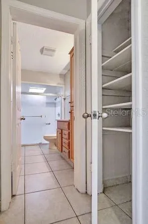 a view of a utility room with closet area