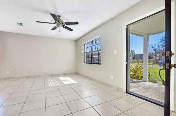 a view of an empty room and window