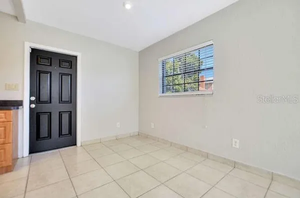 a view of an empty room with window