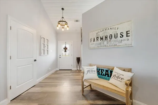 a bedroom with a bed and furniture