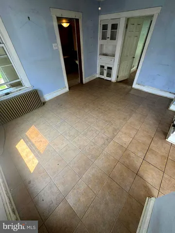 a view of livingroom with furniture and window