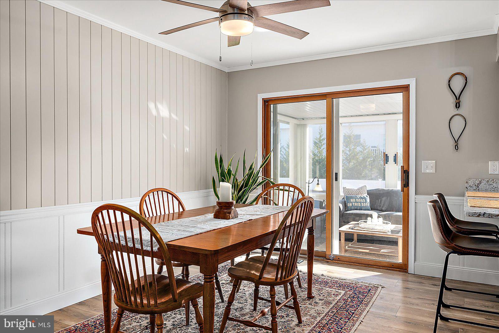30069 Cedar Neck Road Ocean View, DE 19970 - Photo 12 of 61 a view of a dining room with furniture window and outside view