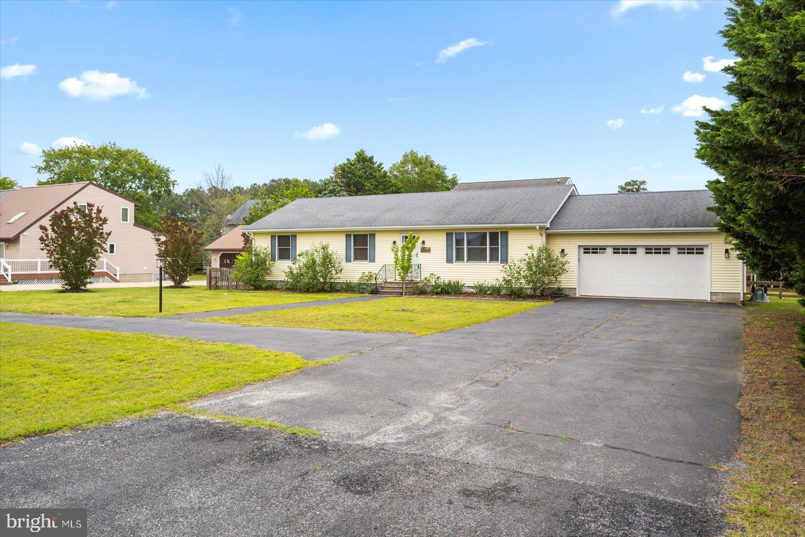 30069 Cedar Neck Road Ocean View, DE 19970 - Photo 39 of 61 a view of house with a swimming pool