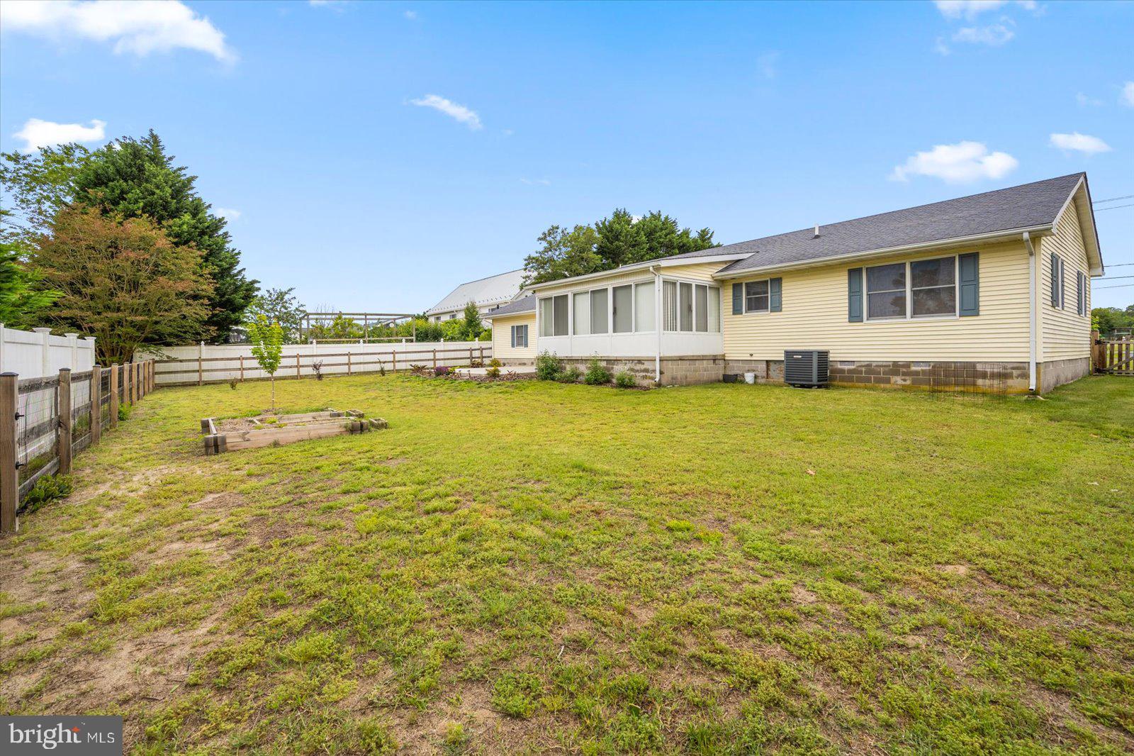30069 Cedar Neck Road Ocean View, DE 19970 - Photo 44 of 61 a view of a swimming pool and an outdoor space
