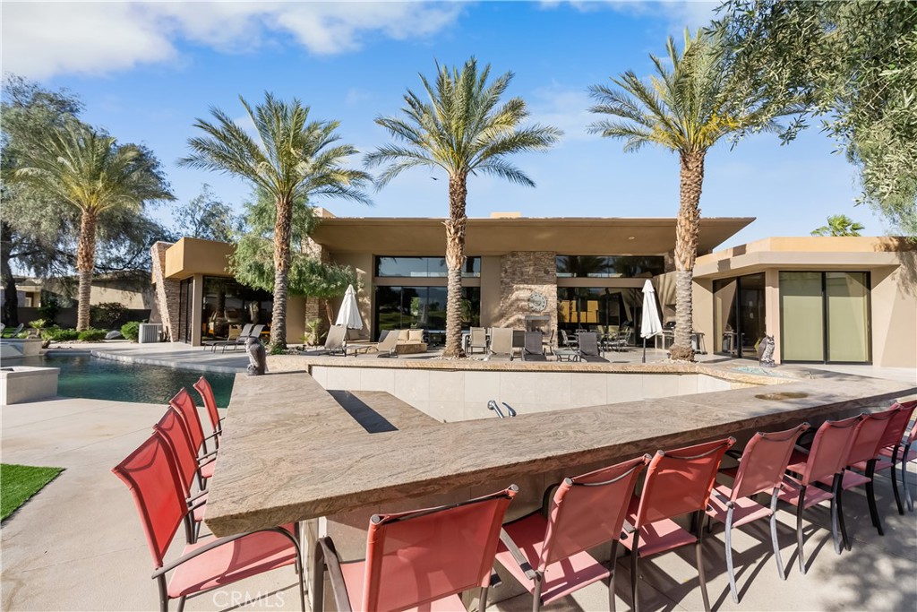 68 Royal St Georges Way Rancho Mirage, CA 92270 - Photo 3 of 75 a view of a house with sitting area and furniture